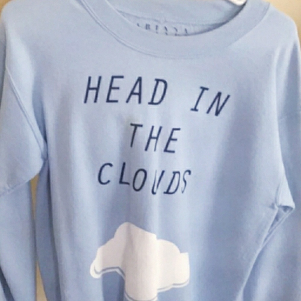 Ariana grande head in the clouds